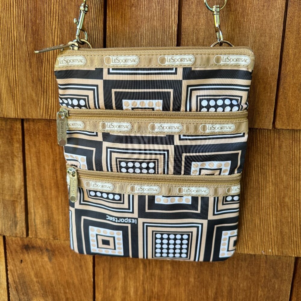 Like New Lesportsac Black/Tan/White Geometric Print Cross-Body - 7.5"W x 9.5" T